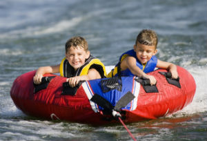 boys tubing on lake ozark